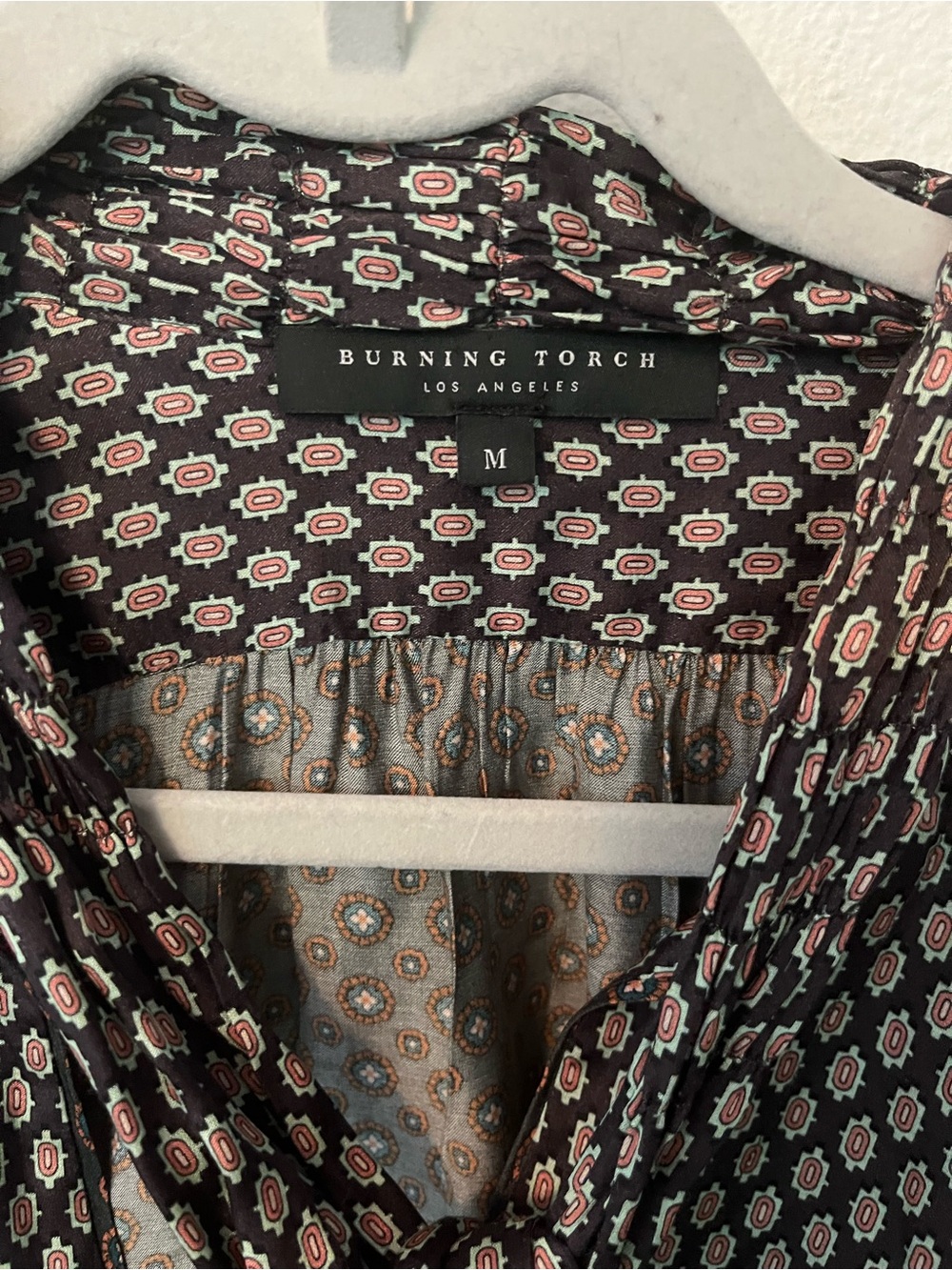 Burning Torch Black Blouse with Pink Geometric Print and Tie Neck - Picture 2 of 5